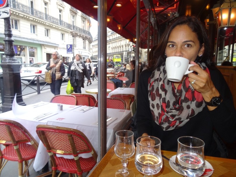 Enjoying a cappuccino in Paris cafe. 