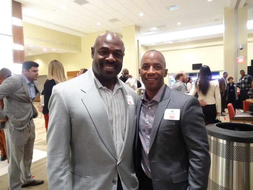 JJ with former teammate Christian Okoye 